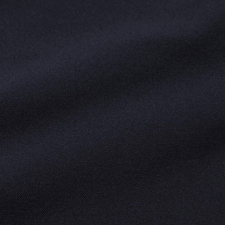 pantaloni uniqlo elasticizzati bidirezionali da uomo con vestibilità affusolata beige