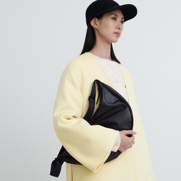 borsa a tracolla rotonda uniqlo gialla da donna