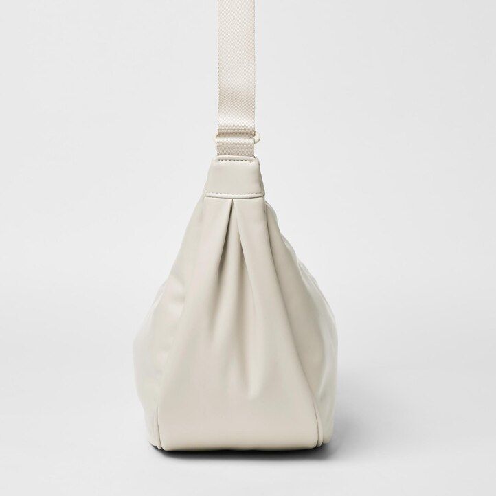 borsa a tracolla rotonda uniqlo gialla da donna