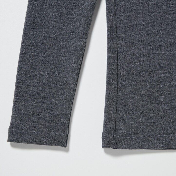 magliette termiche da donna uniqlo heattech ultra warm con collo alto e maniche lunghe bianche