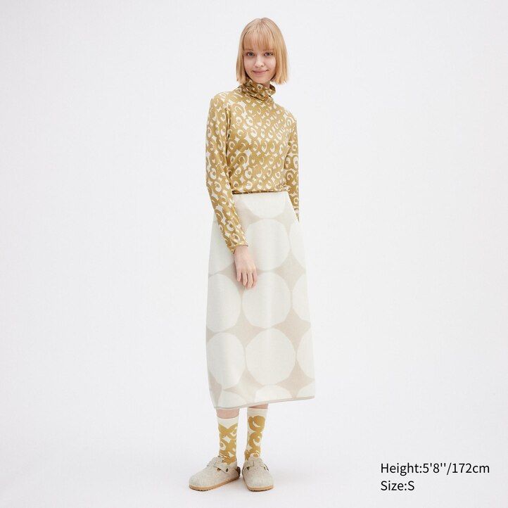 magliette termiche da donna con maniche a spirale e stampa uniqlo heattech nere