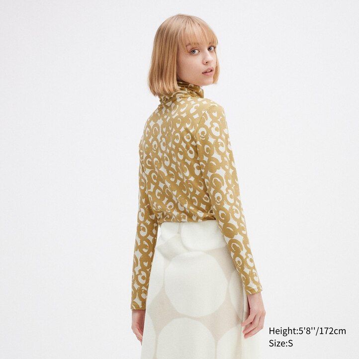 magliette termiche da donna con maniche a spirale e stampa uniqlo heattech nere